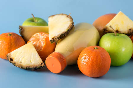 Freshly Blended Yellow and Orange Fruit Smoothie in Bottle Pineapple and Citrus Smoothie Healthy...