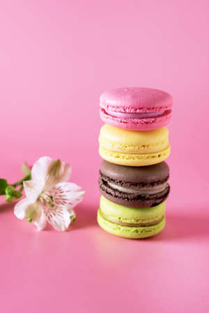 Colored Macarons Modern French Delicate Dessert Lemon Pistachio Strawberry Vanilla Macarons Verticalの写真素材