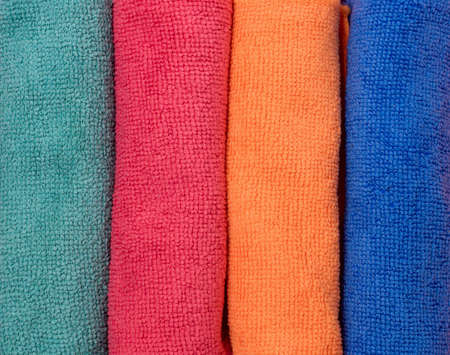 Colored Microfiber Napkins for Cleaning a Top View on a Pink Background Horizontal Close Upの写真素材