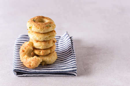 Stack of Homemade Cheese Donuts with Spices on Napkin Horizontal Copy Spaceの写真素材