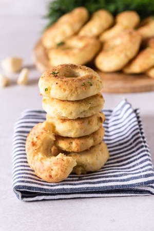 Stack of Homemade Cheese Donuts with Spices on Napkin Close Up Verticalの写真素材