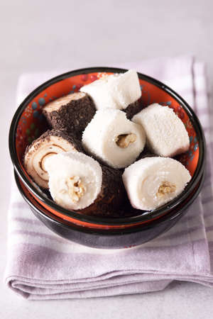 Tasty Turkish delight on Pink Napkin Gray Background Verticalの写真素材