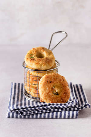 Tasty Homemade Cottage Cheese Donuts with spices gray background napkinの写真素材