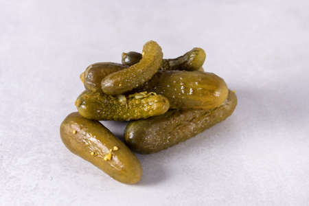 Small pickled cucumbers on gray background Horizontalの写真素材