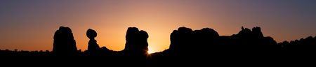 Desert Sunrise Silhouette (including balanced rock) - Arches National Parkの写真素材