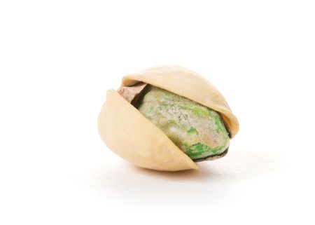 Macro of a Pistachio on a white background.の写真素材