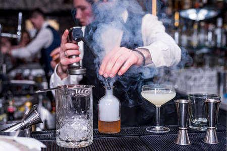 Bartender making a cocktailの写真素材