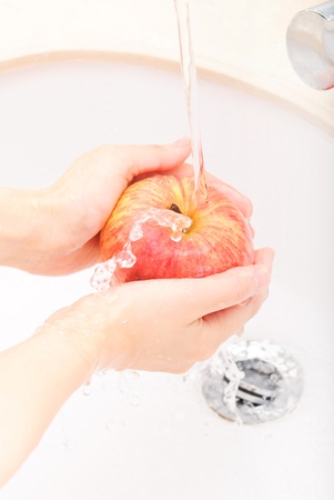 Cleaning appleの写真素材