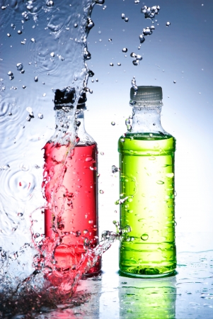 Water splash out of glassの写真素材
