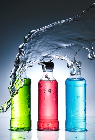 Water splash out of glassの写真素材