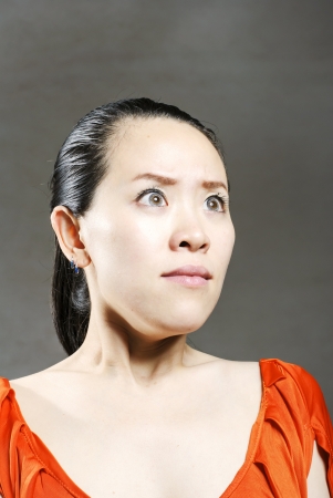 blonde surprised woman on whiteの写真素材