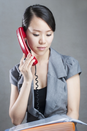 Attractive businesswoman using mobile phoneの写真素材