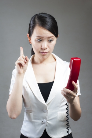 Attractive businesswoman using mobile phoneの写真素材