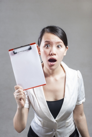 Beautiful business woman with a white banner.の写真素材