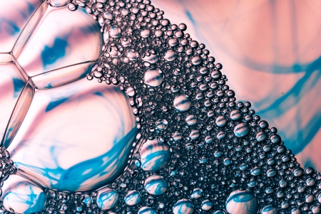 On the surface of the foam, drip into the paintの写真素材