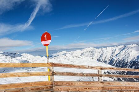 Piste sign in the mountainsの写真素材