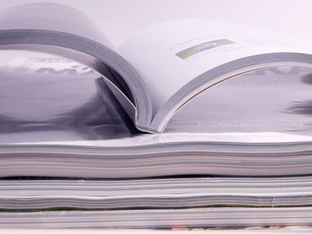 Stack of design magazines on isolated backgroundの写真素材