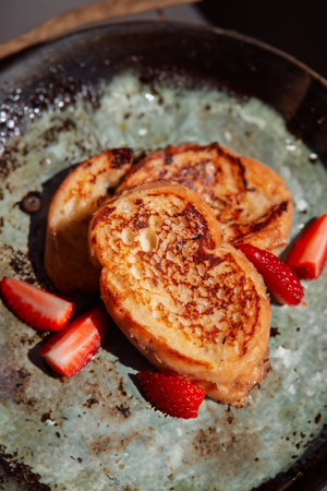 Delicious French toast topped with fresh, juicy strawberries for a delightful breakfast or brunch...