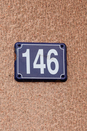 House number as a separate element one hundred forty-sixの写真素材