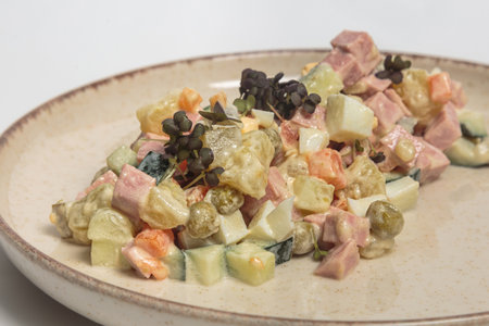 Russian Olivier Salad with Ham, Peas and Vegetablesの写真素材