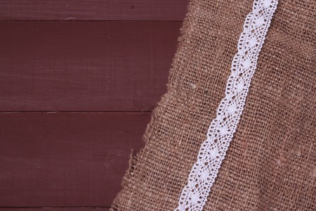 Texture of the old burlap and wood laceの写真素材