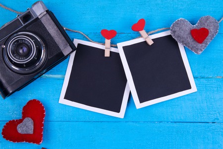 vintage camera on a turquoise wooden background valentine's dayの写真素材