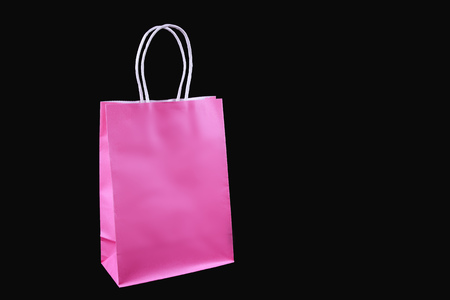 Colour shopping bags on black backgroundの写真素材