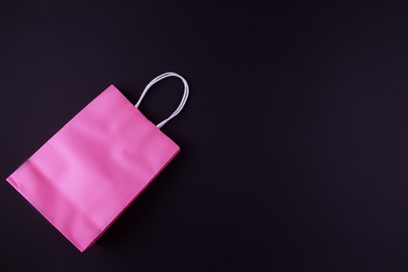Colour shopping bags on black backgroundの写真素材