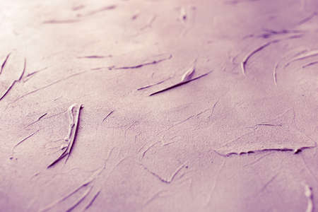 Pink toned concrete wall texture background. Copy space.の写真素材