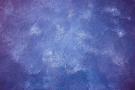 Blue grunge marble or concrete background with dark edges as an abstract grunge background or marble...