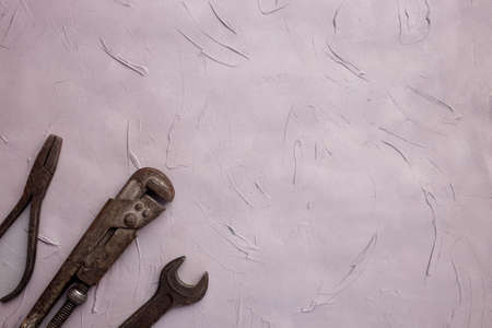 Fathers day or labor day greeting card concept. Vintage old tools on grey concrete background. Copy spaceの写真素材