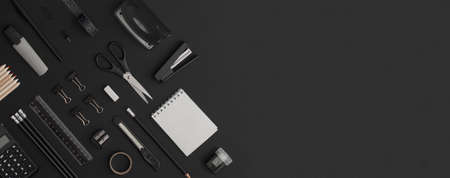 Office and school stationery on black leather background. Back to school