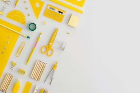 School stationery on a gray background. Top view. Flat lay. Back to school concept.