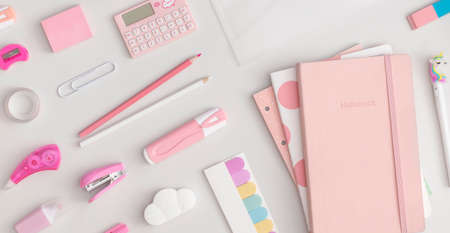 Pattern composition of school stationery on a yellow background. Top view. Flat lay. Back to school concept.の写真素材