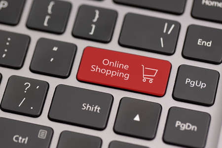 Button with the word online shopping on a keyboard.の写真素材