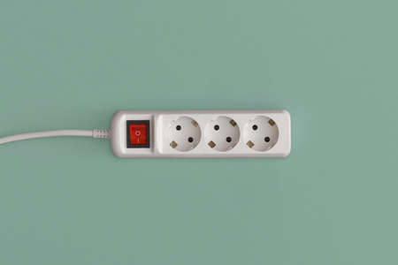 Extension socket on white background. Top view with copy space. Flat lay.の写真素材
