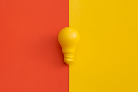 Light bulb on color background. Inspiration and creative idea concept. Top view with copy space....