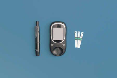 Glucometer on blue background. World Diabetes dayの写真素材