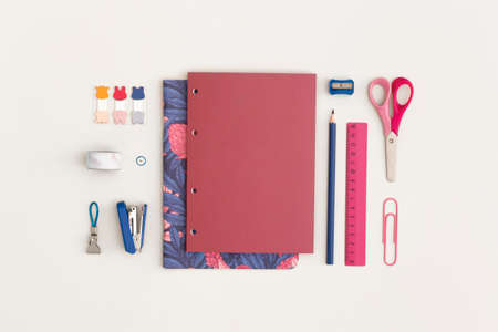 School stationery on white background. Top view with copy space. flat lay. Back to school concept.の写真素材