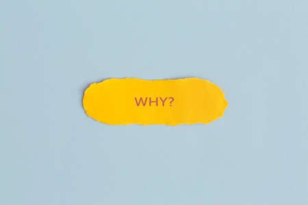Yellow torn paper with text Creative ideas on blue background