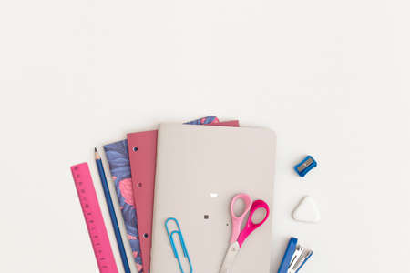 School stationery on white background. Top view with copy space. flat lay. Back to school concept.の写真素材