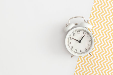 alarm clock. Top view with copy space. flat lay. Back to school concept.