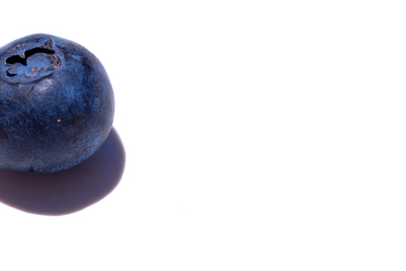 Blueberry. Close-up view of fresh blueberries isolated on white background.の写真素材