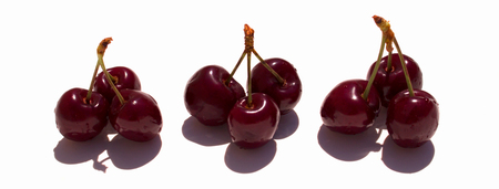 Cherry. Cherries in white bowl. Cherry on white background.の写真素材