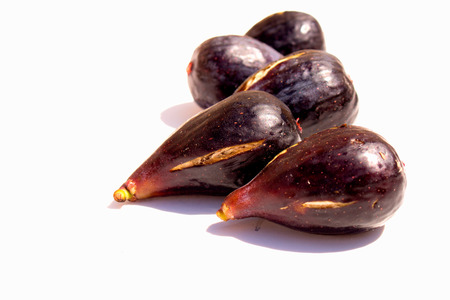 Fresh figs isolated on white background.