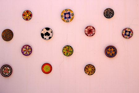 Dishes. Beautiful Spanish white wall with dishes. Traditional design.の写真素材