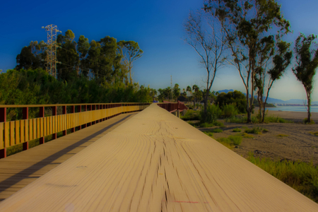 Road. Coastal wooden road. Costa del Sol, Andalusia, Spain.の写真素材