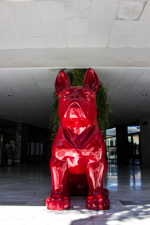 Red bulldog. Sculpture of a bulldog in Puerto Banus, Marbella, Malaga, Costa del Sol, Spain. Picture taken on 27 march 2018.のeditorial素材