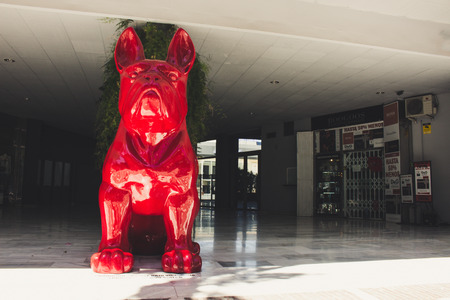 Red bulldog. Sculpture of a bulldog in Puerto Banus, Marbella, Malaga, Costa del Sol, Spain. Picture taken on 27 march 2018.のeditorial素材