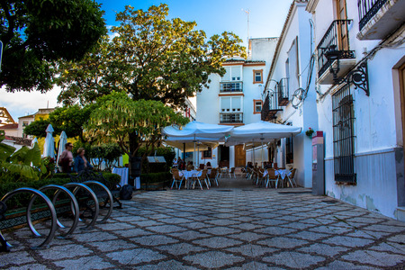 Street. Sunny evening in Estepona street. Malaga province, Andalusia, Spain. Picture taken ? ? "4 May 2018.のeditorial素材